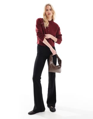 high rise ribbed flare pants in black