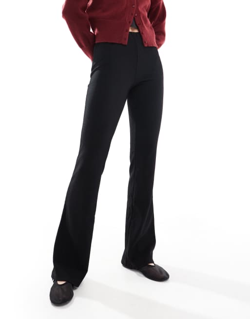 ONLY Tall high rise ribbed flare pants in black | ASOS