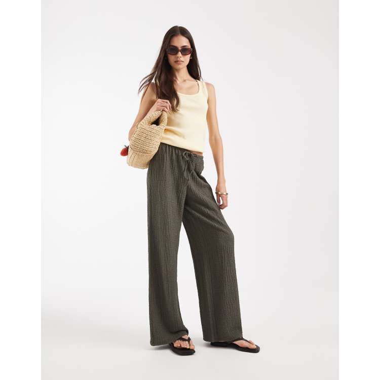 ONLY Tall high waist crinkle textured pants in olive green | ASOS