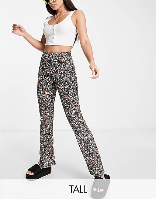 Only Tall high waisted flared pants in black ditsy floral