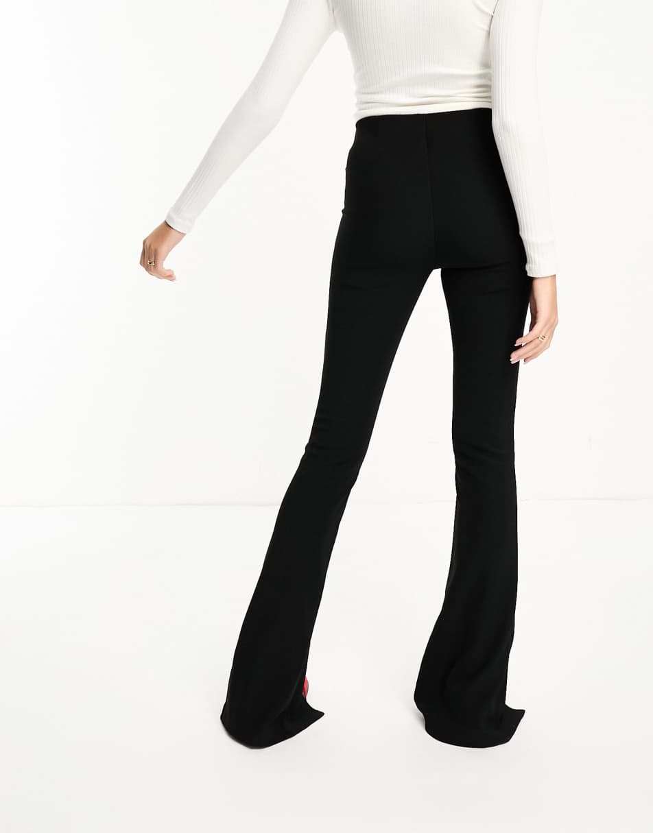 Threadbare faux leather panelled leggings in black