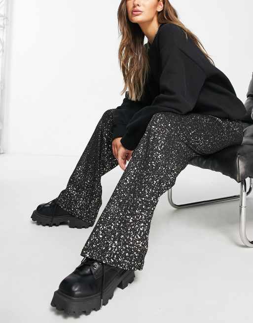 Only textured wide leg trousers in black and gold print