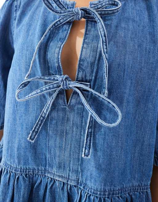 ONLY tie front puff sleeve denim mini dress in mid blue