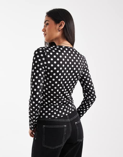 ONLY - Top met lange mouwen in zwart met witte stippen, 3 van 4