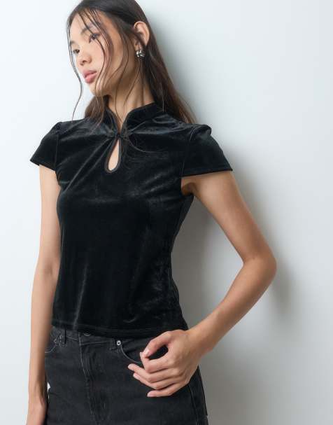 ONLY topp med ståkrage, kort ärm och sammet i svart - view 1