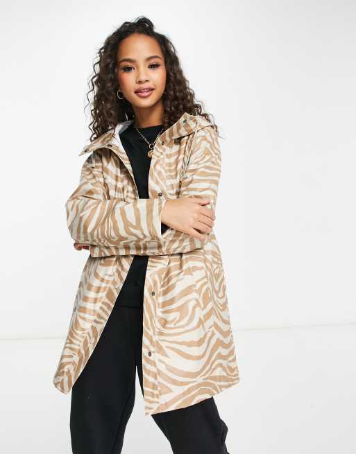 Only zebra print raincoat in gold zebra print