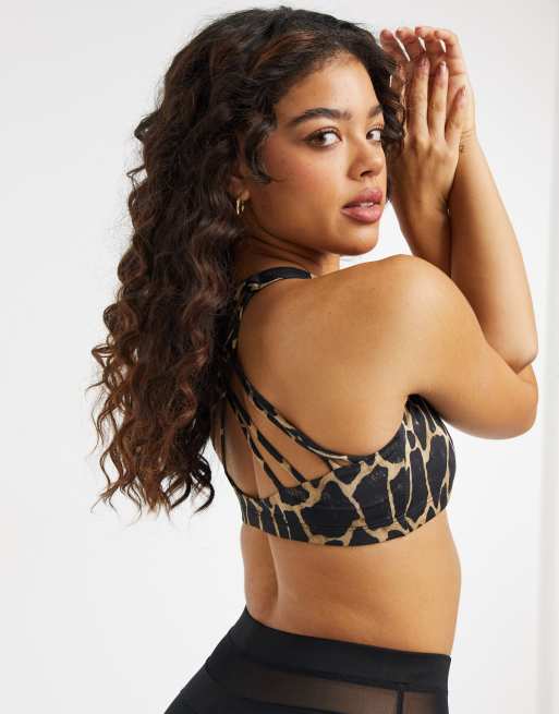 https://images.asos-media.com/products/onzie-chic-medium-support-yoga-sports-bra-in-black-giraffe/21460018-3?$n_640w$&wid=513&fit=constrain