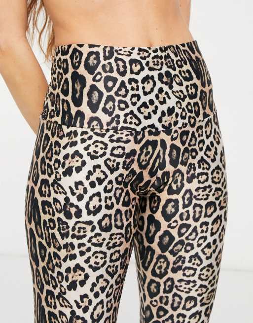 Free People Movement Onzie Flow high rise leopard print yoga leggings sz XL