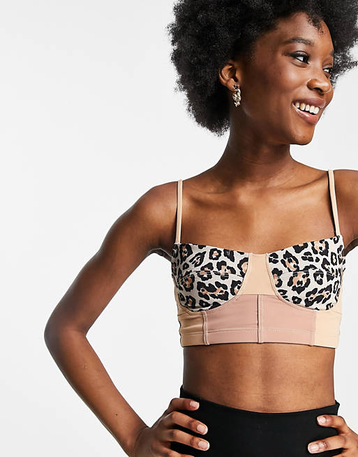 Women Onzie medium support bustier sports bra in golden cheetah print 