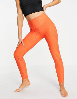 Onzie selenite midi leggings in orange ASOS