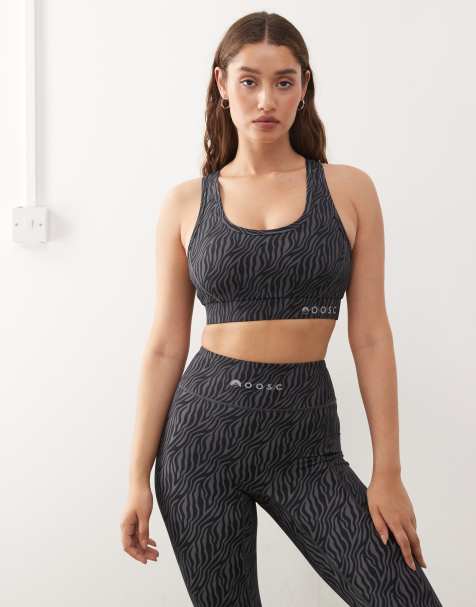 OOSC - Elite - Brassière de sport maintien renforcé avec imprimé tigré et bretelles croisées dans le dos - Noir - view 1