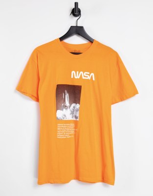 фото Оранжевая oversized-футболка с принтом в виде ракеты nasa-оранжевый цвет merch cmt ltd