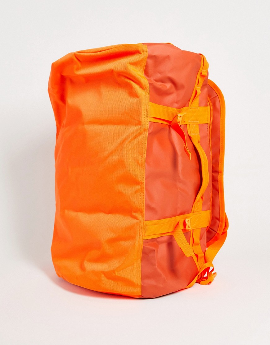 фото Оранжевая спортивная сумка the north face base camp - 50 л-оранжевый цвет