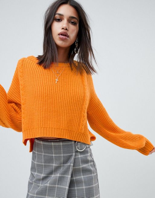 Оранжевый пуловер