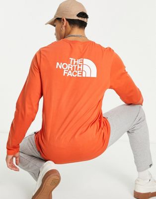 фото Оранжевый лонгслив the north face easy-оранжевый цвет