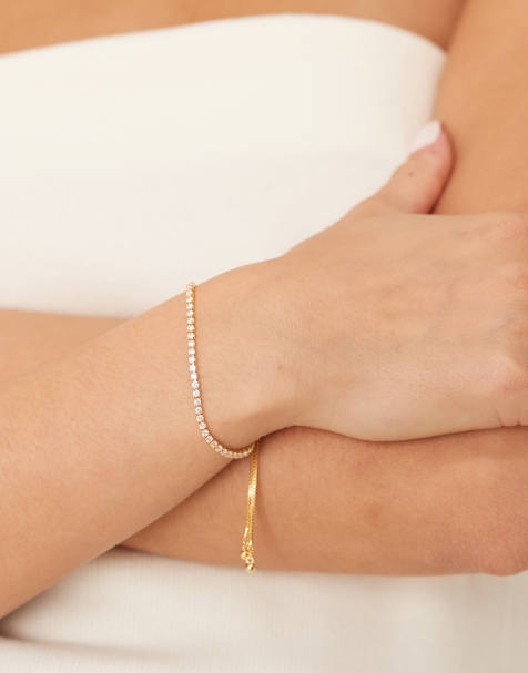 Orelia – 18k guldpläterat, tunt tennisarmband med strass i dra på-stil - view 1