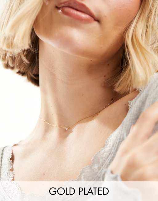 Orelia - Collier avec barre en cristal plaquée or 