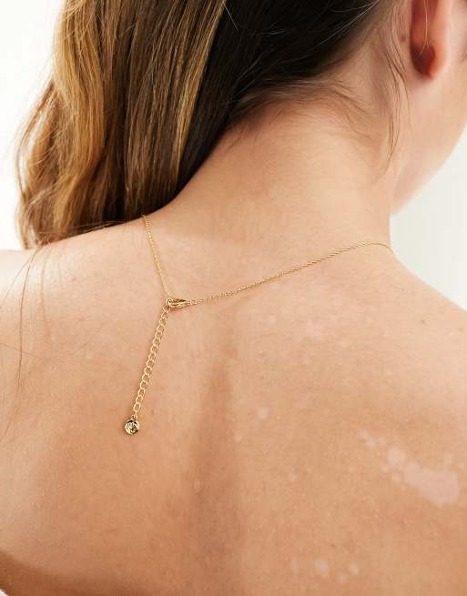 Orelia - Collier en plaqué or 18 carats avec nœud et barre en T délicate, 4 de 4