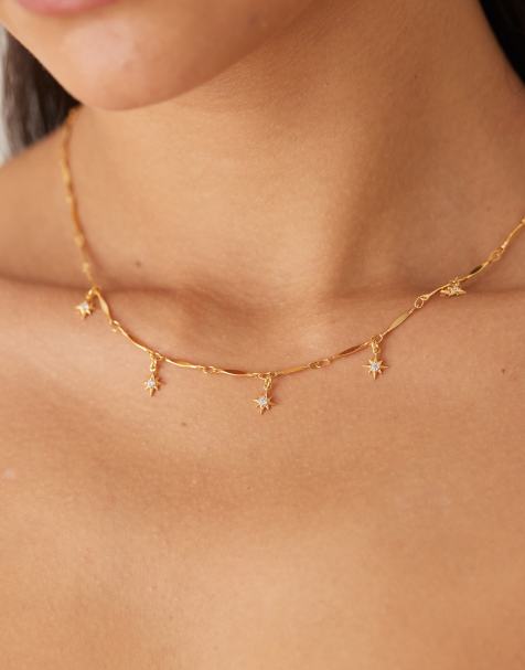 Orelia - Collier en plaqué or avec charms soleil à cristaux - view 1