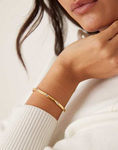 Orelia crystal embellished open bangle in gold plated - view 1