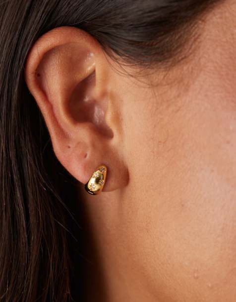 Orelia crystal starburst tapered huggie hoop earrings in 18k gold plated - view 1