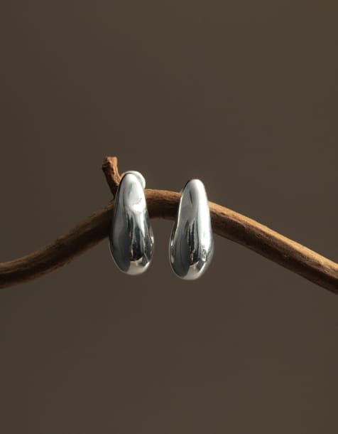 Orelia droplet stud earrings in silver plated - view 1