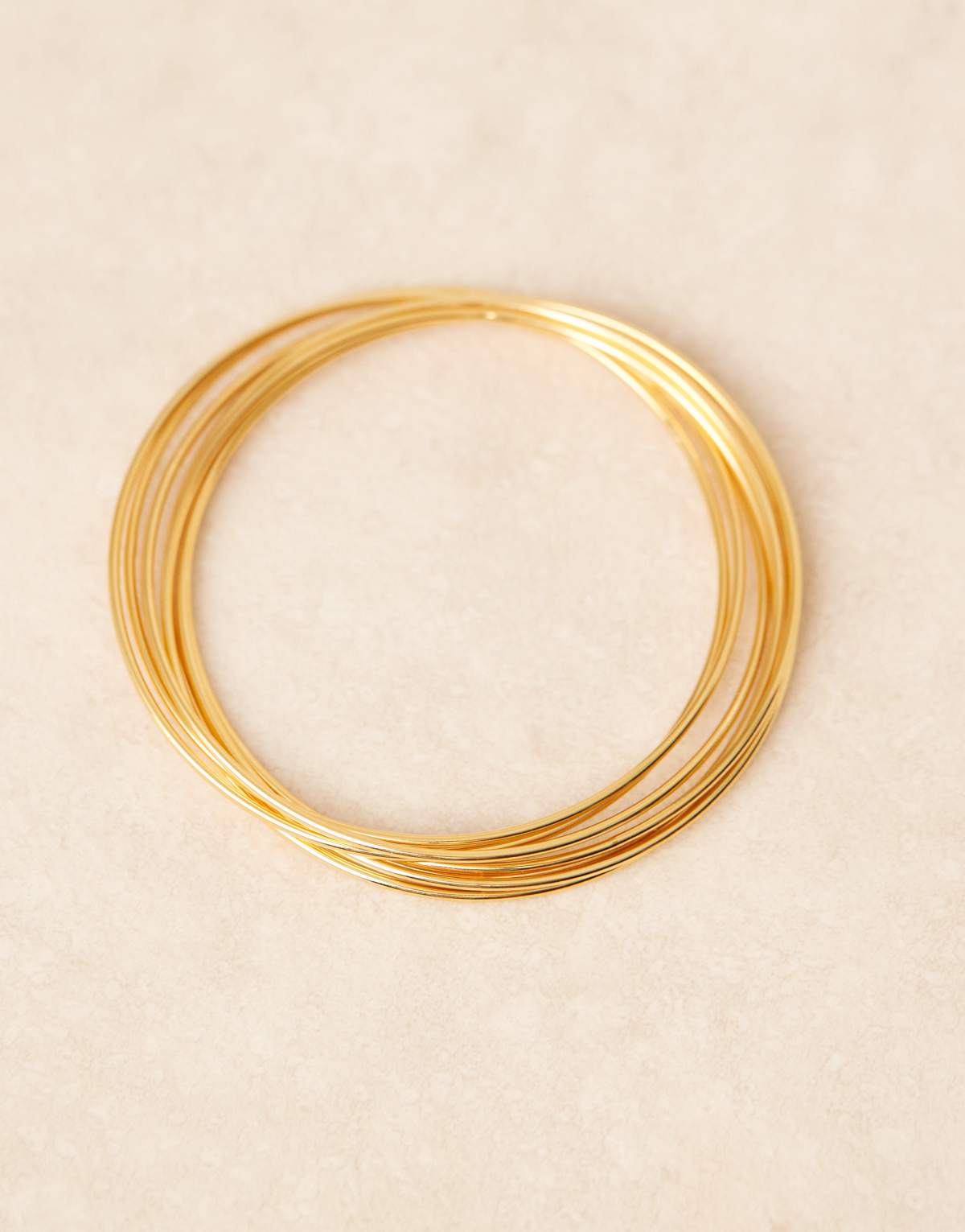 Orelia fine multi interlocking bangles in 18k gold plated