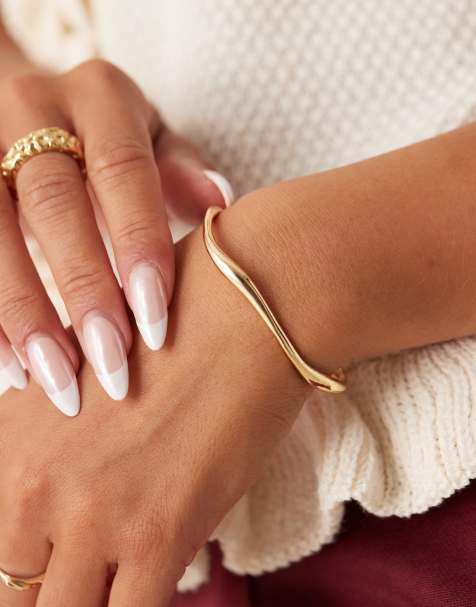 Orelia fine wave bangle bracelet in 18k gold plated - view 1