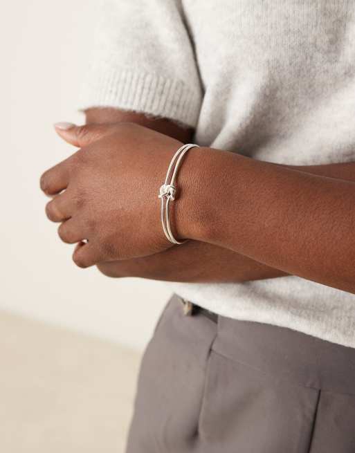 Orelia - Gepolijste armband met in elkaar grijpende knoop in sterling zilver