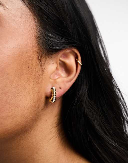 Orelia gold plated ridged huggie hoops | ASOS