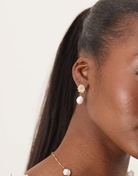 Orelia gold plated shell & pearl earrings in pale gold - view 1