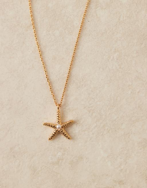 Orelia gold plated starfish charm necklace in pale gold, 2 of 3