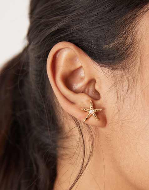 Orelia gold plated statement starfish stud earrings in pale gold - view 1