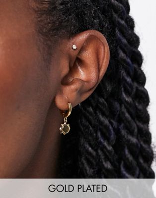 Orelia huggie hoops earrings with sun charms in gold plate