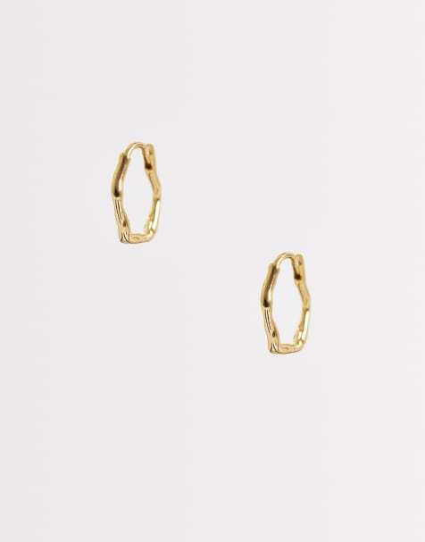 Orelia oval wave huggie hoops in 18k gold plated - view 1