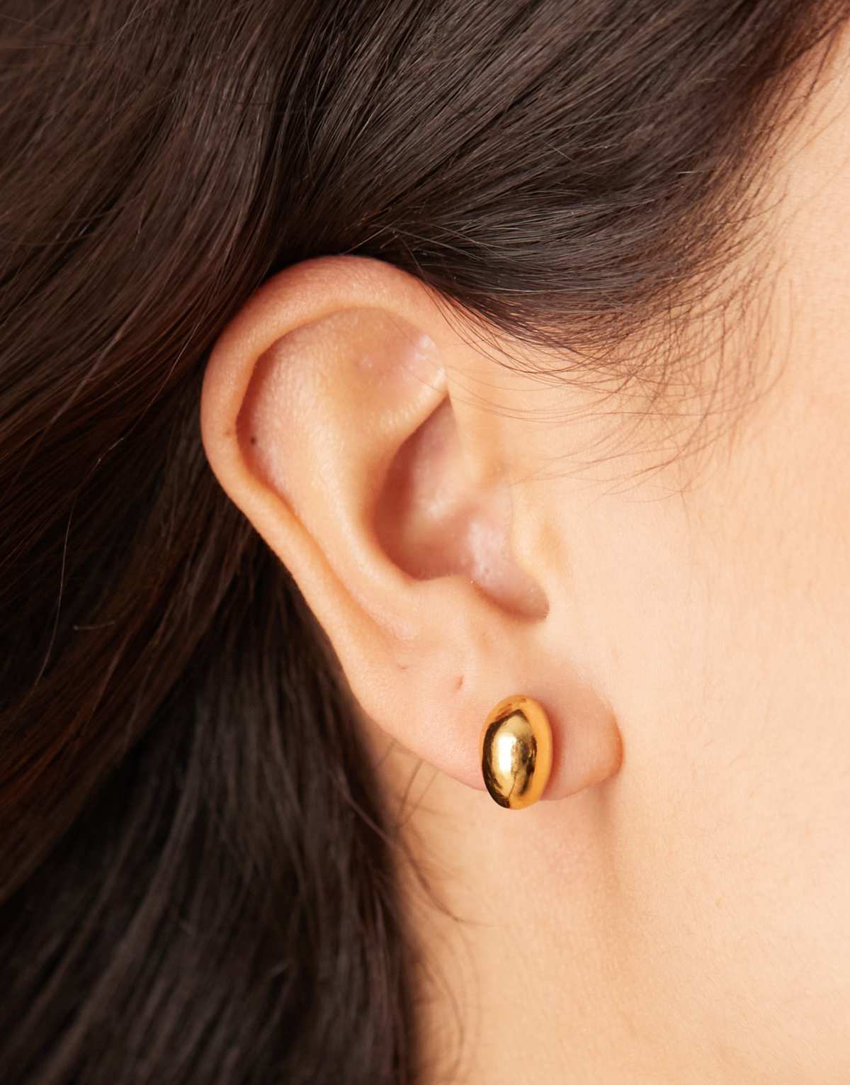 Orelia polished domed mini stud earrings in 18k gold plated