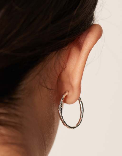 Orelia polished molten oval mid size hoop earrings in
