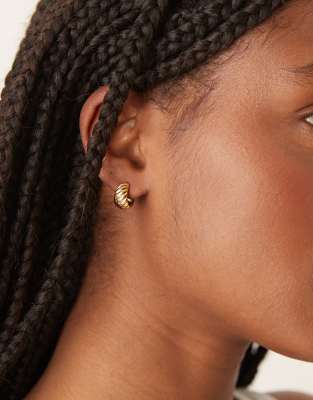Orelia twist detail chubby huggie hoop earrings in 18k gold plated - view 1