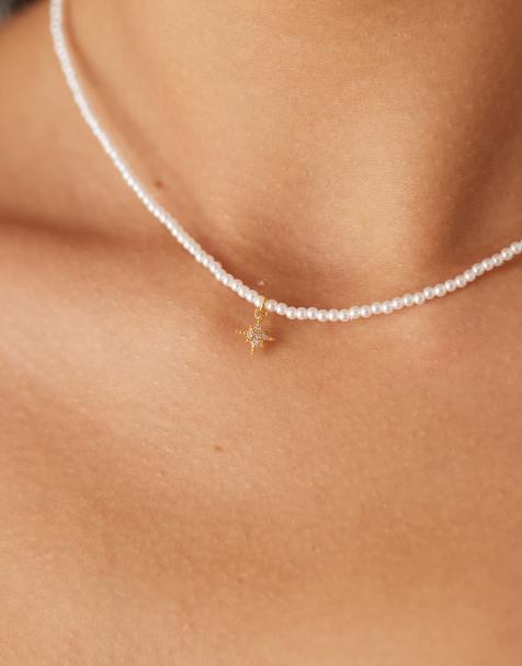 Orelia – Vergoldete Halskette mit Mikroperlen und Pavé-Starburst-Anhänger - view 1