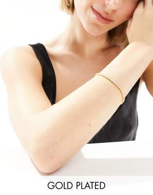 Orelia - Vergoldetes Tennis-Armband mit transparentem Kristall-Design-Goldfarben