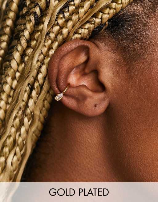 Orelia - Vergulde enkele oorcuff versierd met kristallen