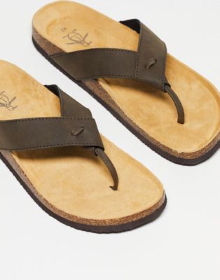 footbed flip flops in brown