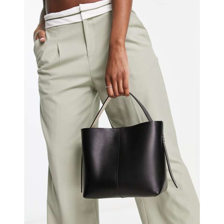 Other Stories cross body bucket bag in black