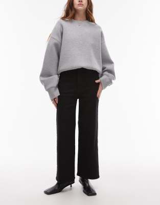 & Other Stories - Elastische, kurz geschnittene Jeans mit Rinse-Waschung in Schwarz und weitem Bein