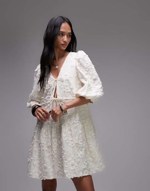 & Other Stories embroidered mini dress with front tie detail and tiered hem in white