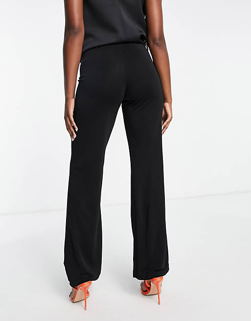 https://images.asos-media.com/products/other-stories-flared-jersey-trousers-in-black/203522012-2?$n_640w$&wid=513&fit=constrain