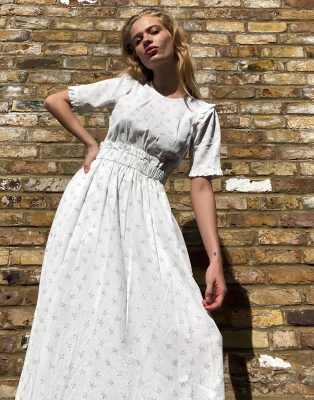 white dress with frill hem