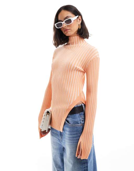 & Other Stories - Geribbelde gebreide getailleerde sweater met uitsnijding aan de zoom in tweekleurig oranje 