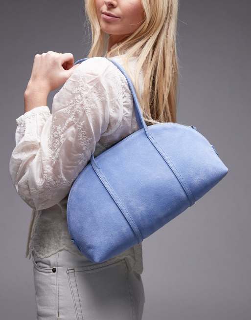 & Other Stories – Geschwungene Wildleder-Schultertasche in Blau mit zwei Henkeln