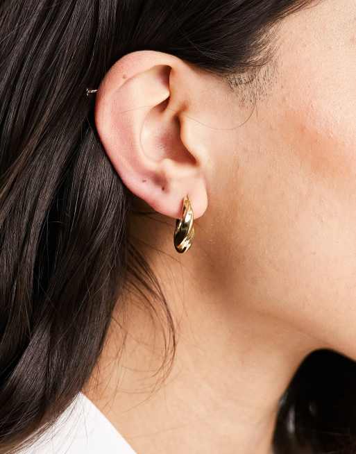 & Other Stories – Guldfärgade grova creoler med snurrad design